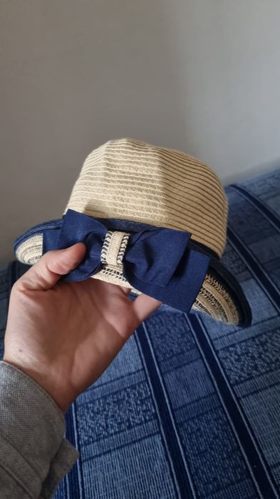 Słomkowy kapelusz damski z kokardką