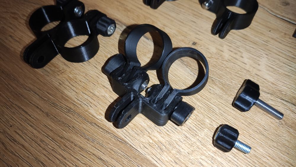 Uchwyty na latarkę (np Convoy S2+) GoPro Blendr