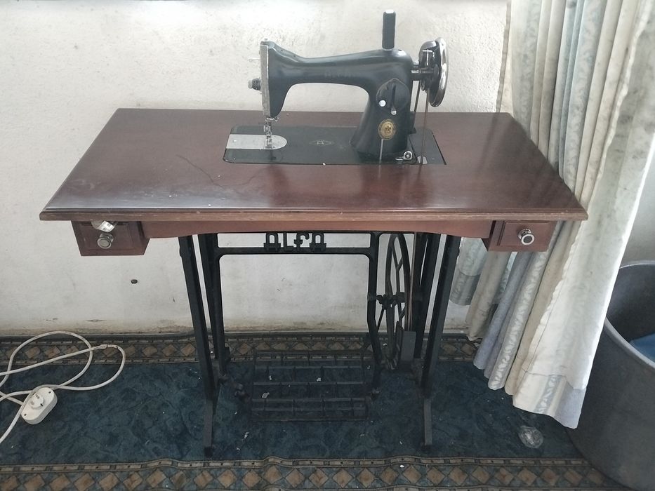 Máquina de costura alfa