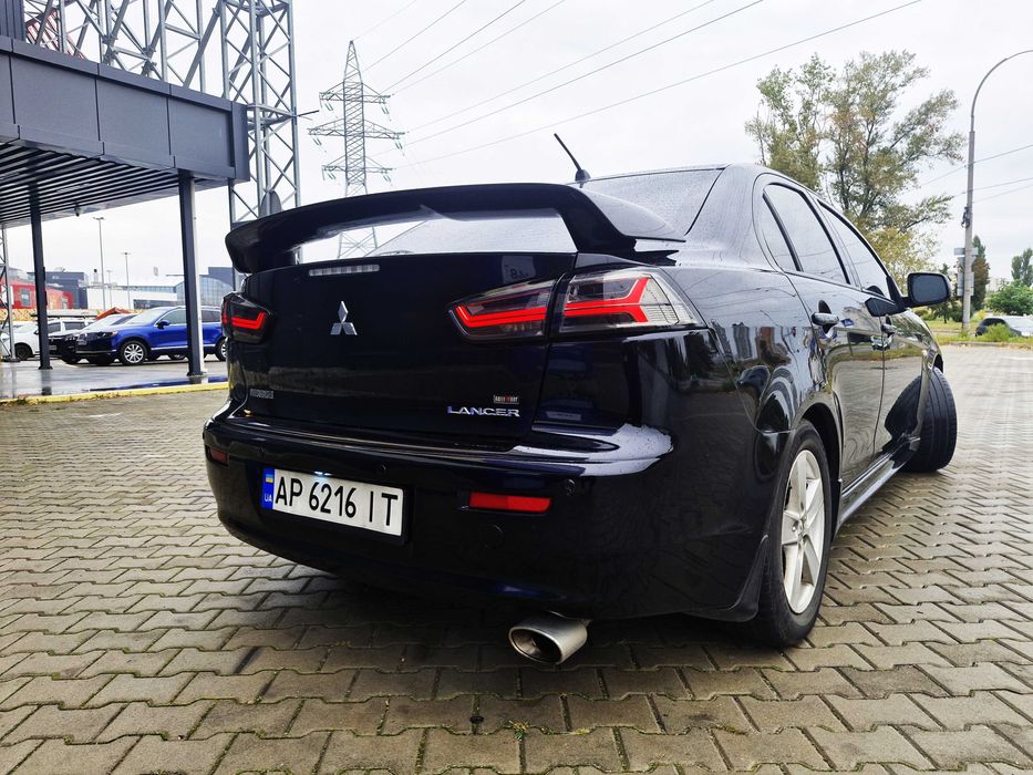 Митсубиши Лансер Х