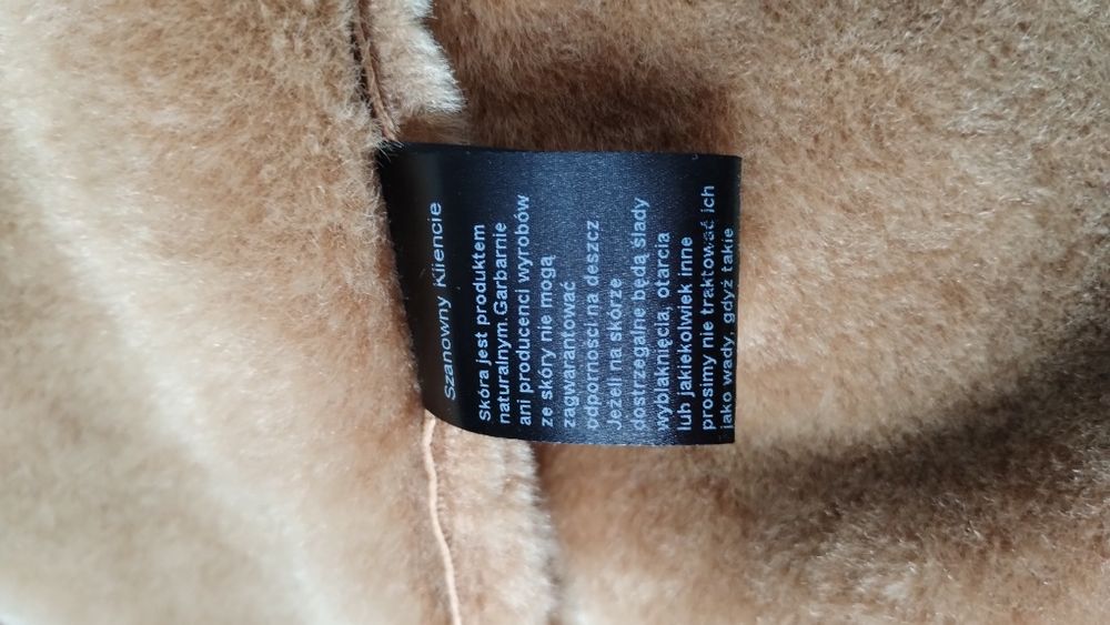 Piękny męski kożuch skórzany.