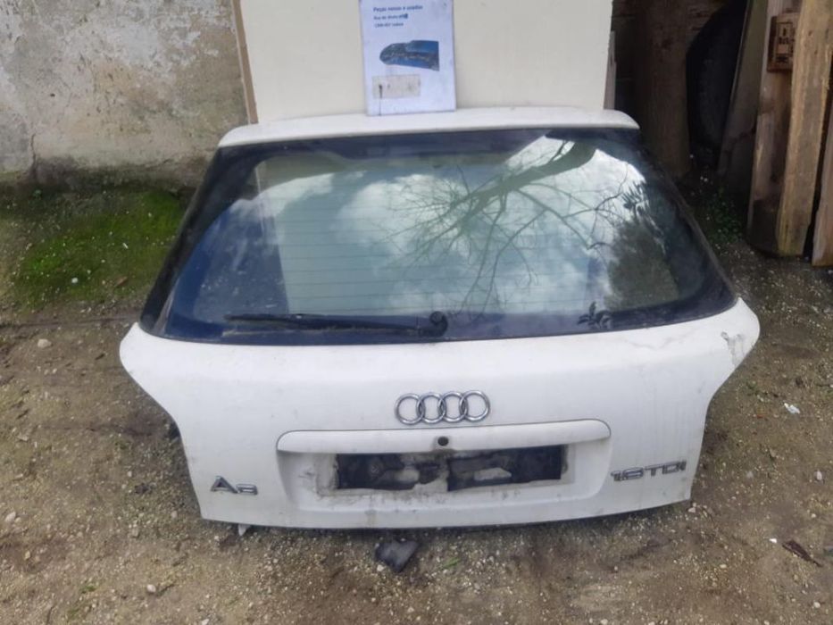 tampa da mala Audi A3 1997