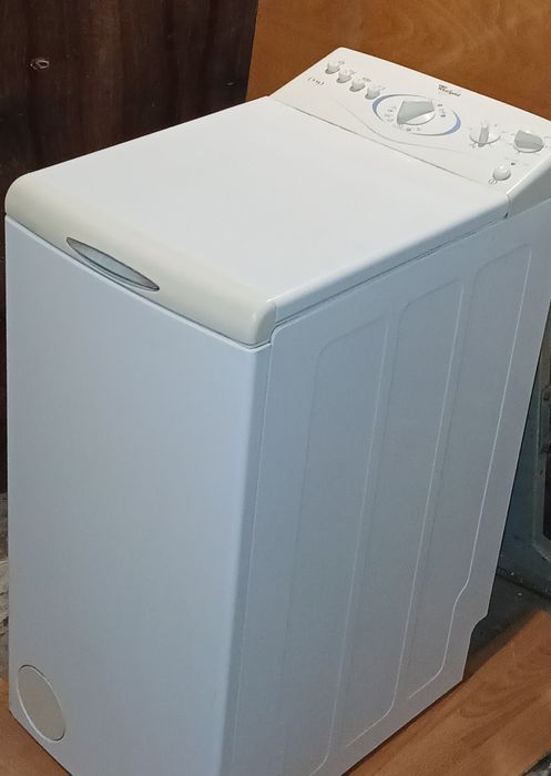 Вертикальна пральна стиральная машина автомат