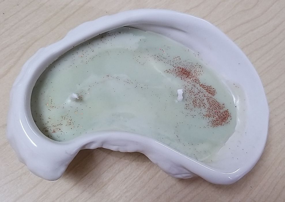 Vela aromática em cerâmica.