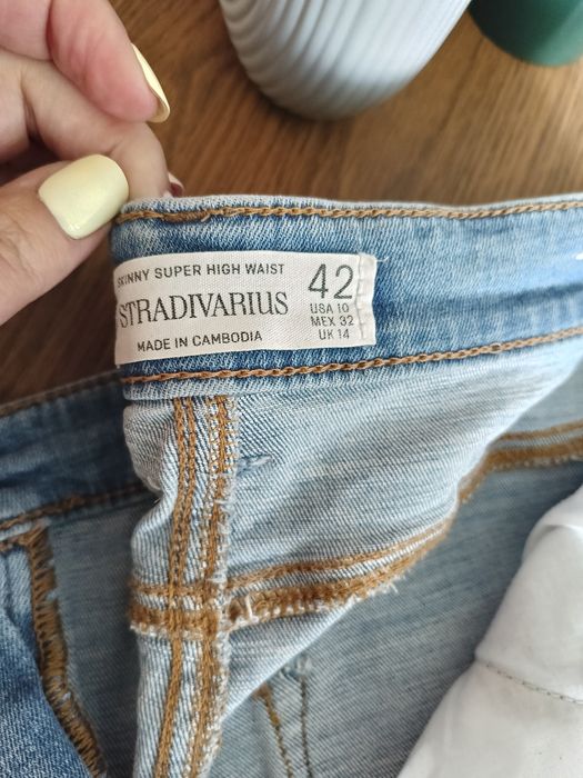Spodnie damskie dżinsy Stradivarius 42
