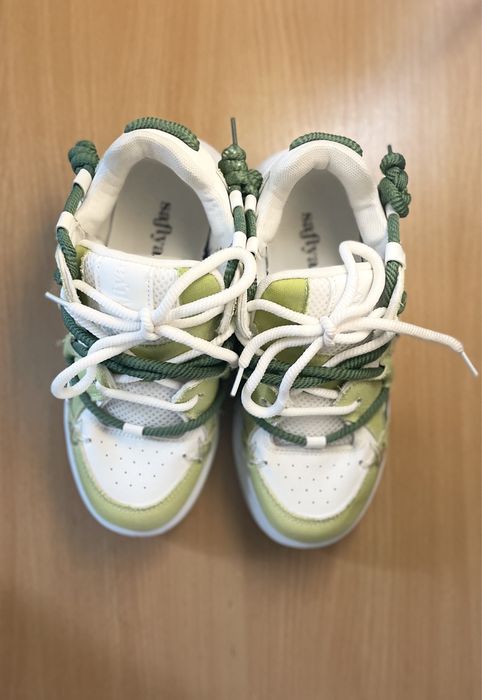 Зелені жіночі кросівки