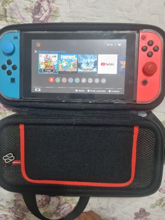 Nintendo Switch com caixa jogos e todos acessórios