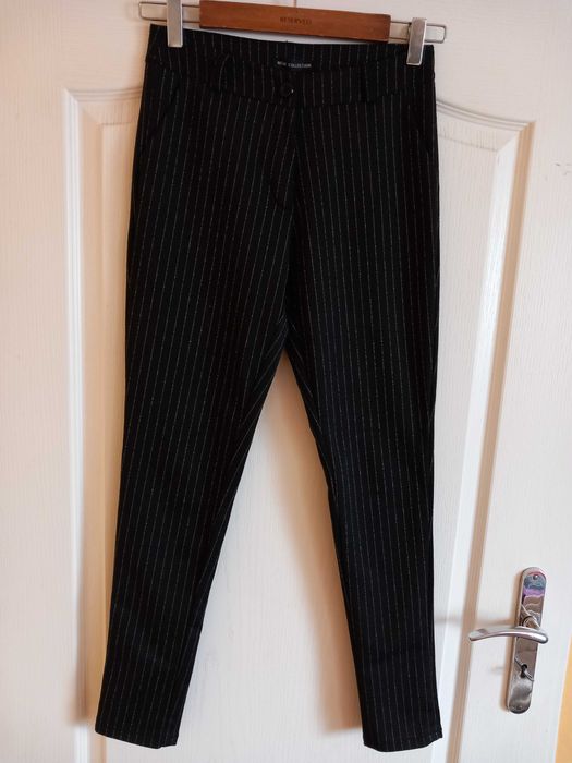 Eleganckie spodnie damskie " New collection " , rozmiar sugerowany XS / S , używane .