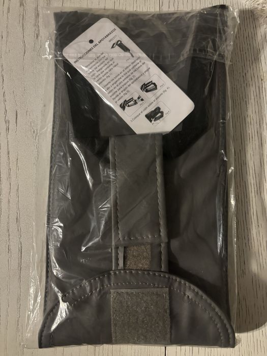 Nowa szara podkładka do łóżka od masażu.