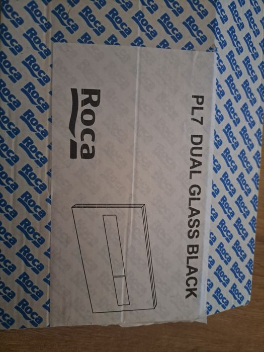 przycisk firmy Roca