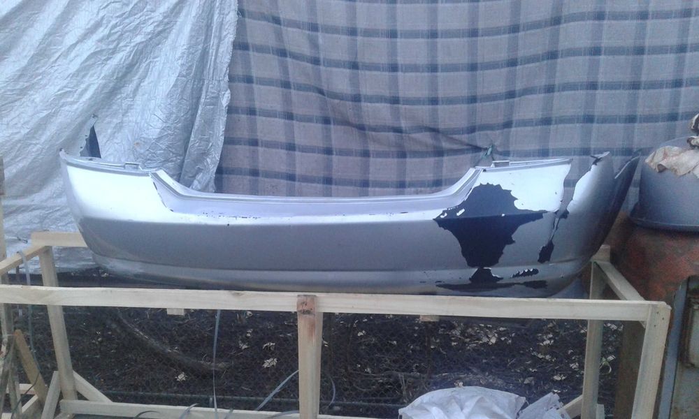 Бампер задний NISSAN Tiida