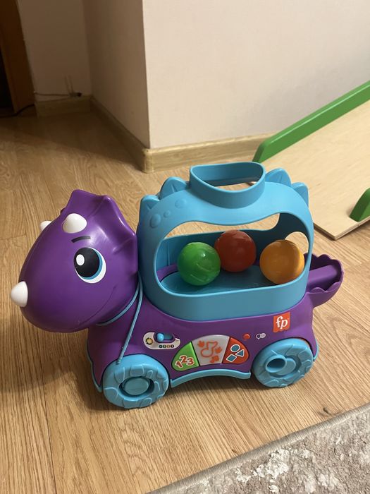 Каталка fisher price веселий трицератопс