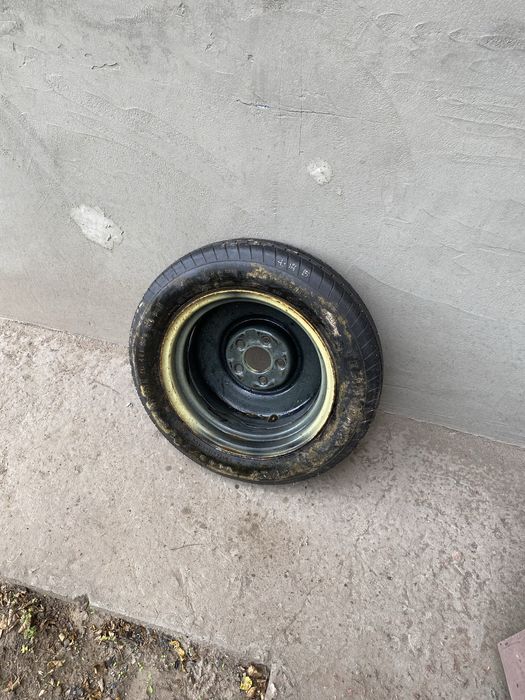 Докатка (запасне колесо).