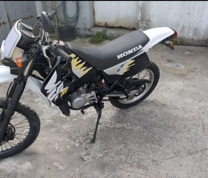 Motorizada Honda DT