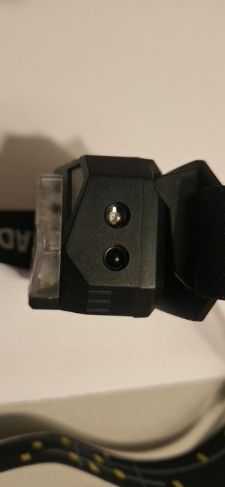 Lanterna de cabeça.