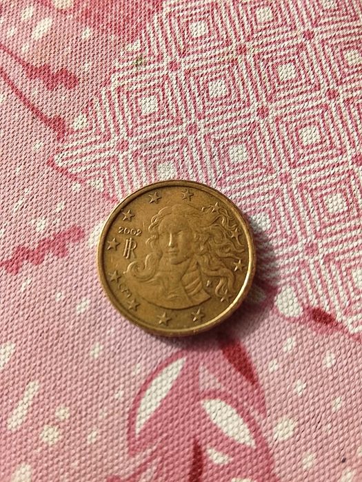 Set moedas 2002 Itália mais oferta de moeda do mesmo ano com erro.