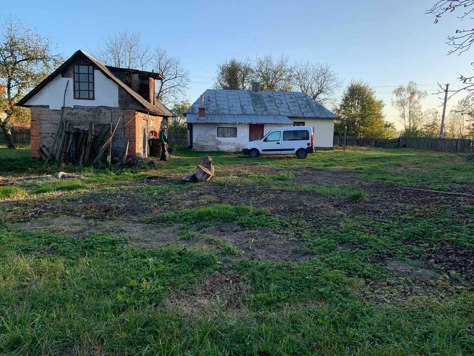житловий будинок та земельна ділянка 46,5 сот