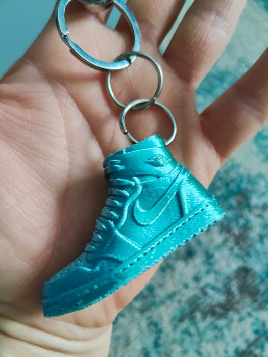 breloczek but Nike Nowy