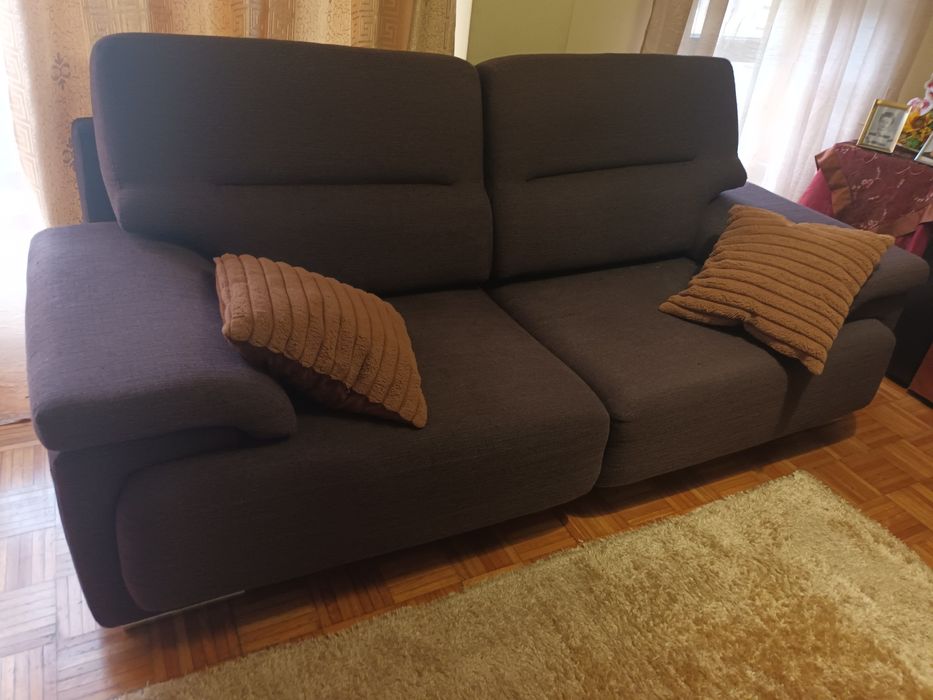 Sofá cama de três lugares