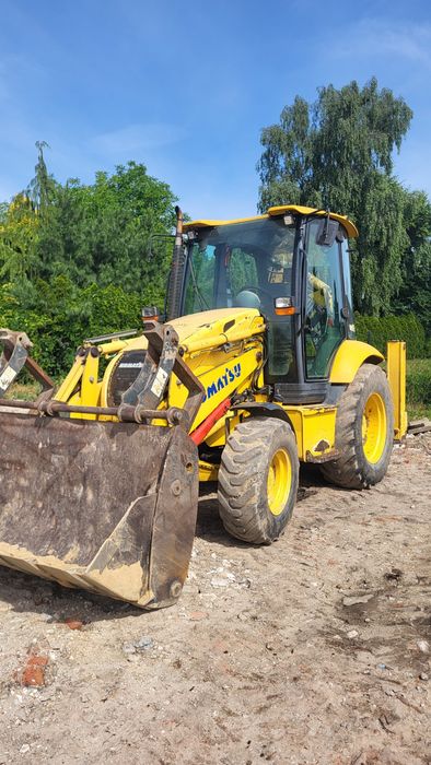 Koparko-ładowarka Komatsu WB97R-5/klima/automat/joystick/pływające ramię/szybkozlącze