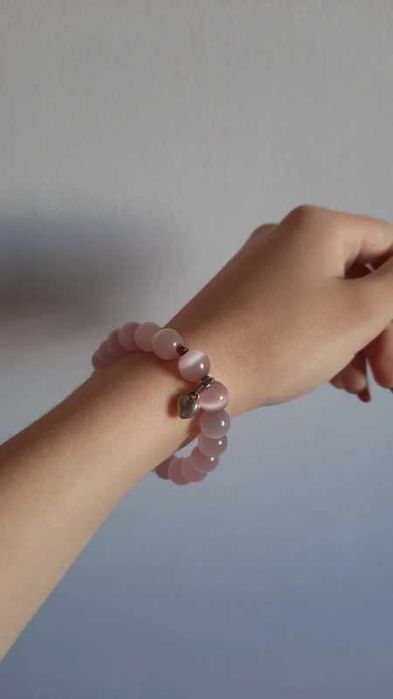 Różowa bransoletka z serduszkiem i cyroniami coquette