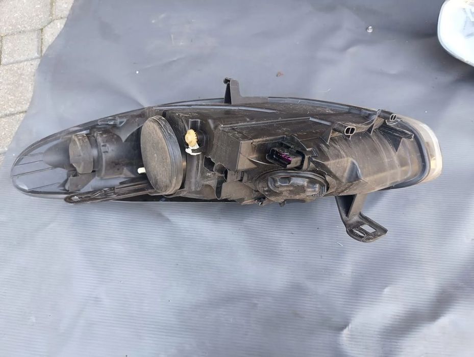 reflektor prawy lewy renault fluence 09-12. 260100076r 260600078r
