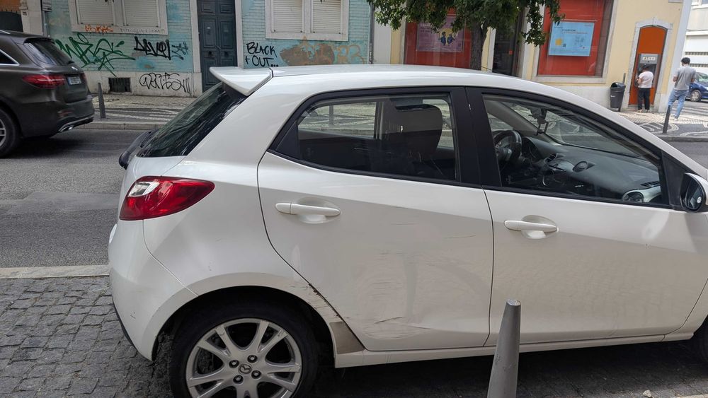 Mazda 2 1.3 gasolina +-211 mil KMS com AC 2010