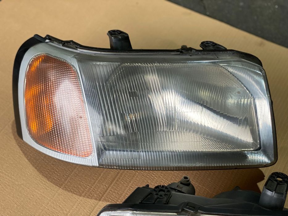 Oticas farois da frente Land Rover Freelander