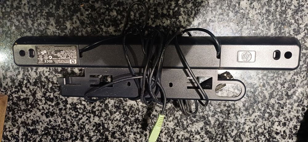 Coluna som Hp em barra para monitor