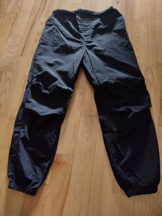 Nowe spodnie dresowe przeciwdeszczowe rozm 134/140