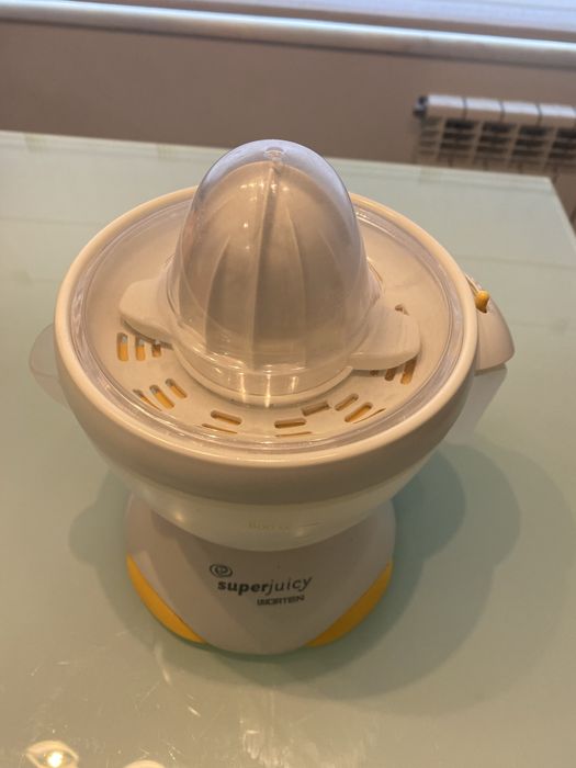 Espremedor de frutas eletrico