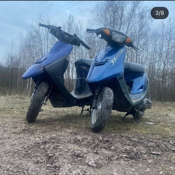 Скутер Сузукі сепія