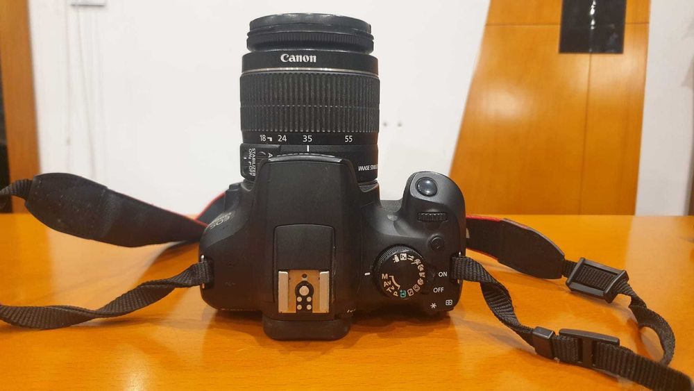 Canon EOS 1300D com fita + Lente Kit 18-55mm + 2 baterias e carregador