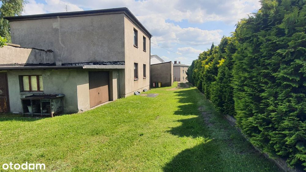Dom z piwnicą , garażem i dużym ogrodem