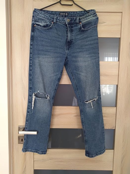 Spodnie z rozcieciami na kolanach