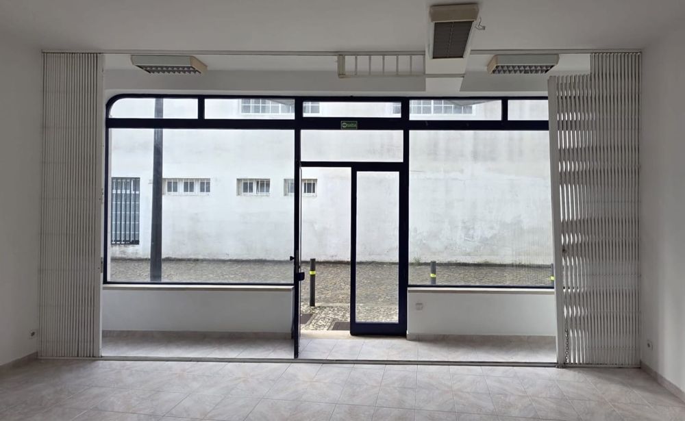 Grade de segurança metálica extensível (tipo leque)