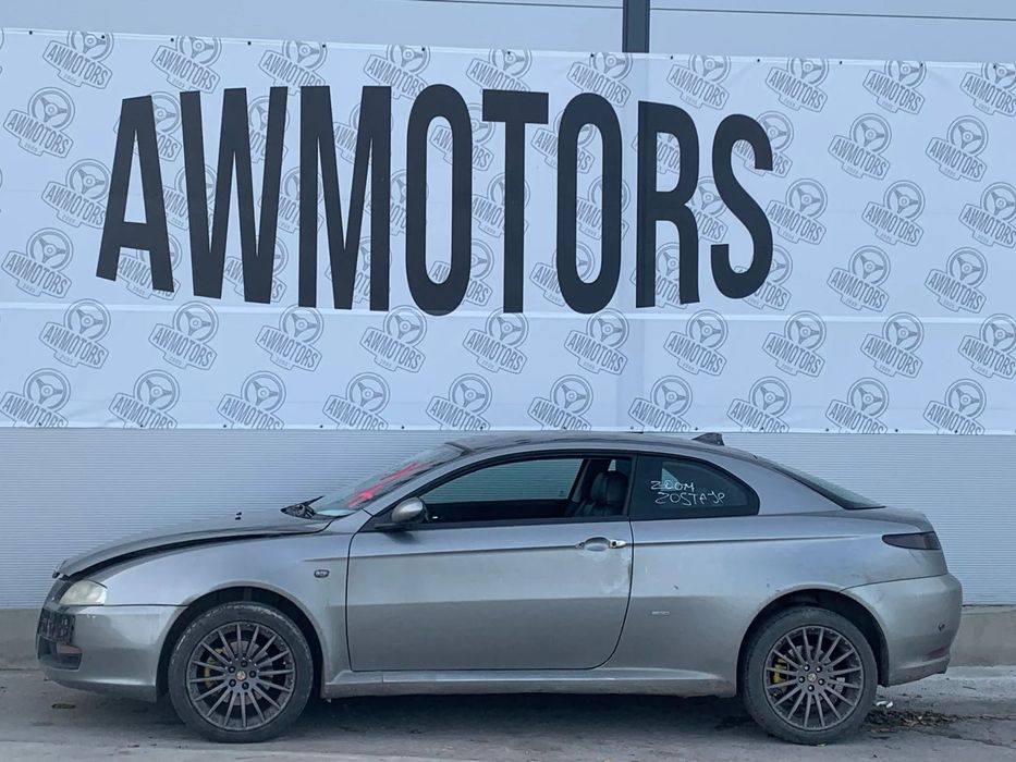 ALFA ROMEO GT 2006 *SAMOCHÓD NA CZĘŚCI* 2896 MASKA, LAMPA, DRZWI, LUSTERKO, ZDERZAK, GRILL, BŁOTNIK, KLAPA, BELKA, DESKA, FOTELE, KANAPA, ĆWIARTKA, KIEROWNICA, TARCZE, ZACISKI, ZAWIESZENIE, KOMPLETNY PRZÓD, KOMPLETNY TYŁ, LICZNIK, ZEGARY, PRAWE LEWE PRZÓD