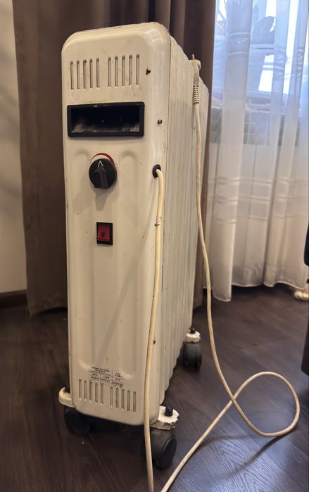 Масляний обігрівач