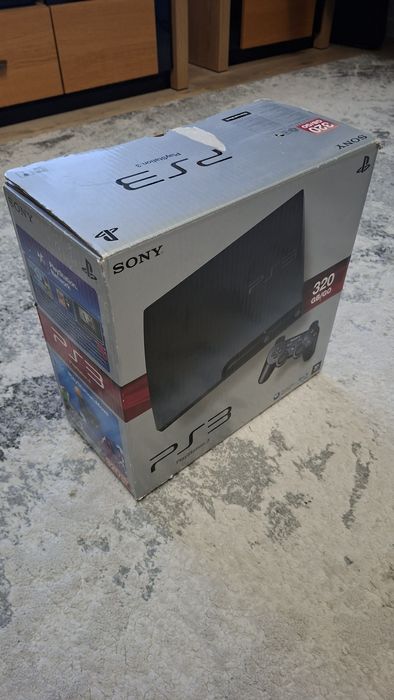 PlayStation 3 Slim (model CECH-3004B) + move + gry