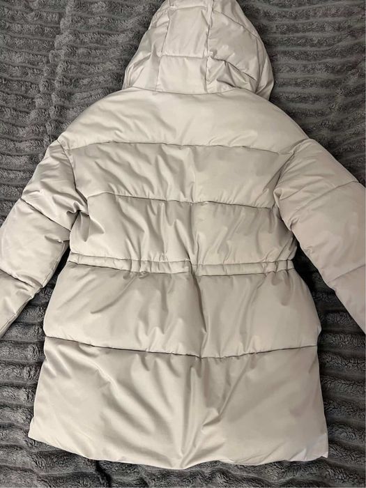 Тепла пухова куртка