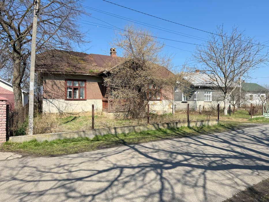 Ділянки 24 сот.землі та будинку  по вул. Шашкевича 150 у с. Дуліби