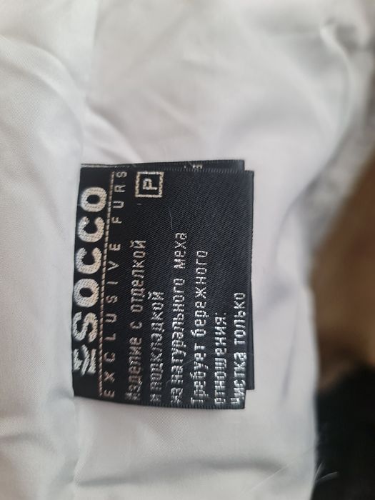 Женский пуховик с мехом