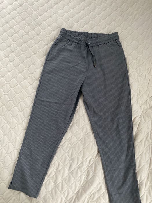 Світлі жіночі брюки  Reserved