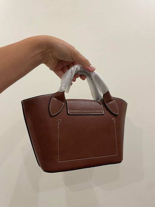 Mala longchamp castanha em pele