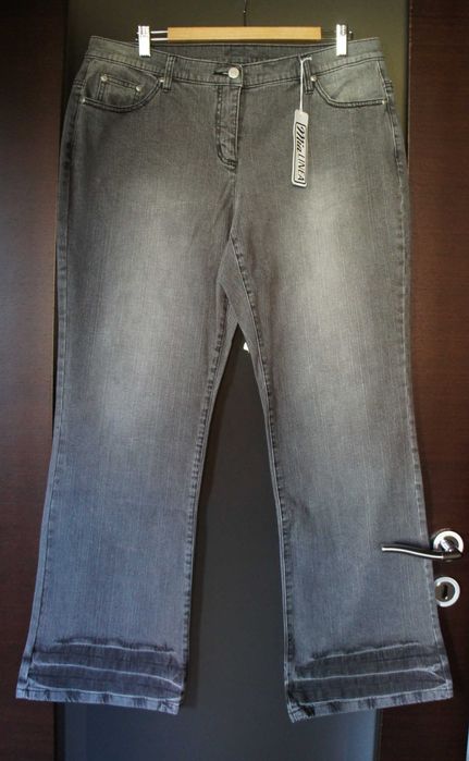 damskie spodnie dżinsowe dzwony 48 / 46 jeansy szerokie nogawki duże