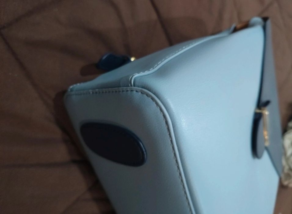Mochila azul nova