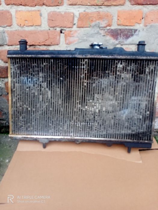 Радіатор джілі бу