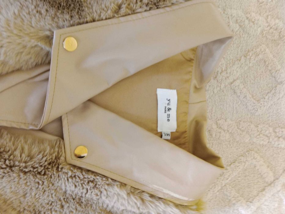 Colete You e Me Paris, muito bem cuidado.