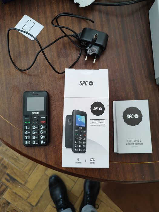 Telefone SPC semi-novo.