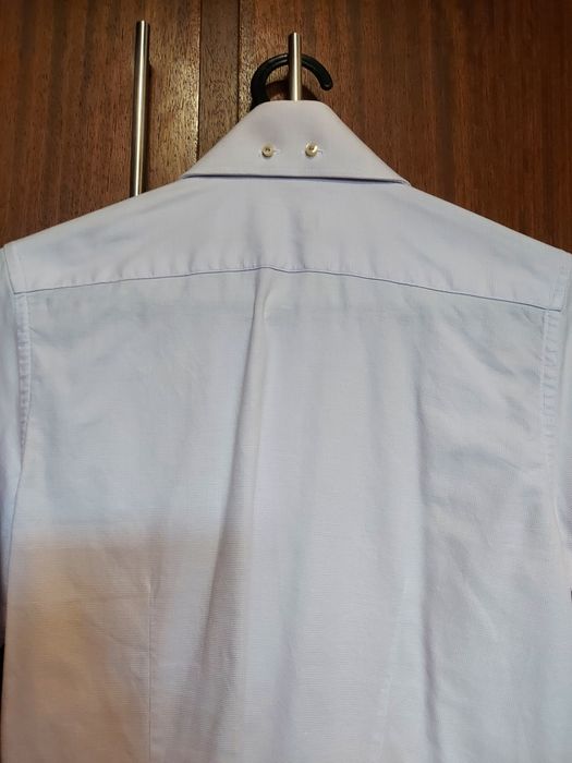 Camisa feminina da Sacoor rosa e branca